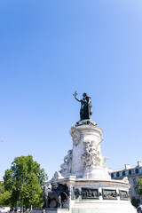 Fototapeta na wymiar Statue from below on a blue sky