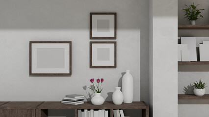 Copy space on wooden low-cabinet against the white wall with empty picture frame mockup