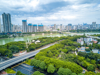 Obraz premium City buildings and river bank landscape in Nanning, Guangxi, China