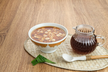 Wedang Kacang, a traditional Indonesian herbal drink, made from peanuts, ginger, palm sugar and pandan leaves

