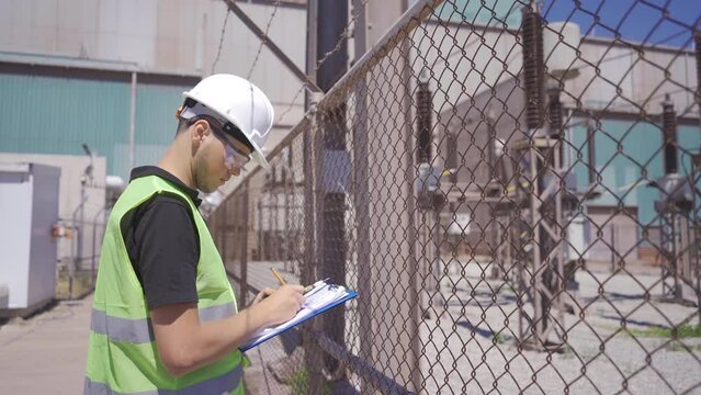 The switchyard of the Power Plant.
The engineer supervising the switchyard is working.
