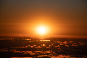 Fototapeta na wymiar epic sunset over clouds