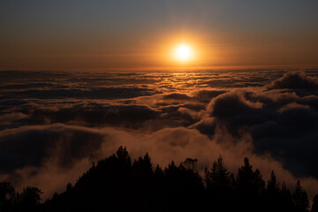 sunset over the clouds