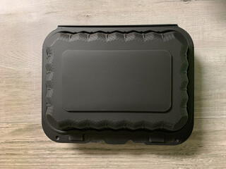 Black to go food container.