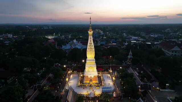 Aerial view of Phra That Phanom temple at twilight in Nakhon Phanom, Thailand.