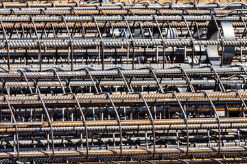 Reinforcing cages for bored piles stacked at the construction site. Reinforcement of reinforced concrete piles.