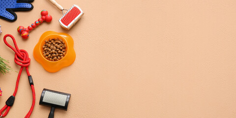 Different pet accessories on beige background with space for text, top view