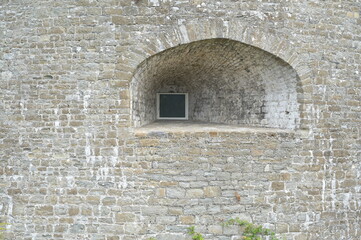 Cannon port with a window in it at an Artillery coastal fortress in Kent. 