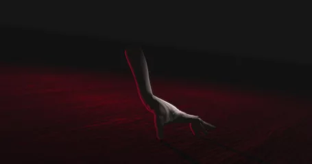 Foto op Plexiglas Image of hand walking in dark space © vectorfusionart