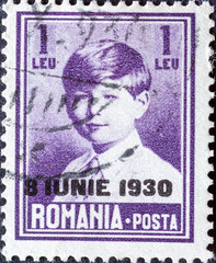 ROMANIA - CIRCA 1930: a postage stamp from Romania , showing a portrait of Michael I of Romania - overprinted 1930 June 8. Circa 1930