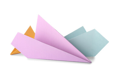 Colorful paper planes on white background