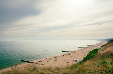 beach and sea - swimmers and sunbathers on Bournemouth Beach