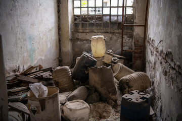 Abandoned industrial building interior covered with dangerous acid and chemicals material after explosion. Apocalyptic scene. Hazard and poisonous substances.