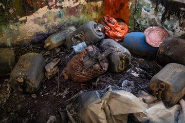 Abandoned industrial building interior covered with dangerous acid and chemicals material after explosion. Apocalyptic scene. Hazard and poisonous substances.