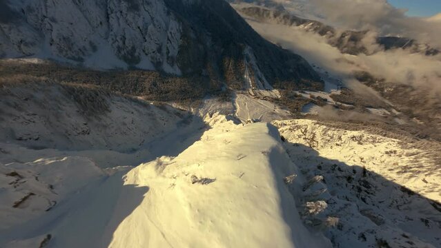 Proximity down to valley, snow in valley, Cinematic FPV shot with GoPro 10, Cinematic PolarPRO filters