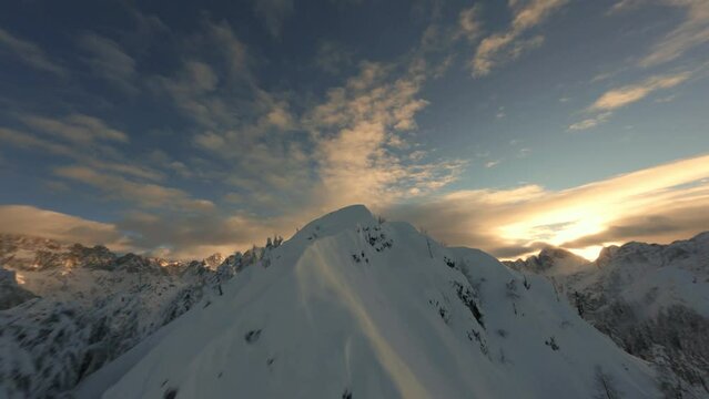 Mountain surfing on top of the mountain, snow with sunset, Cinematic FPV shot with GoPro 10, Cinematic PolarPRO filters