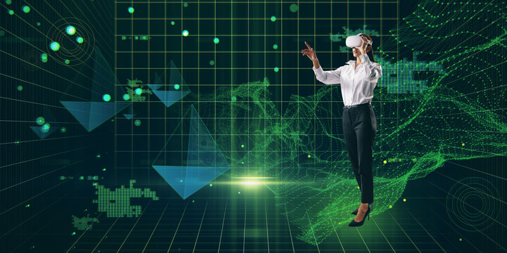 Thoughtful young european businesswoman with VR glasses standing on creative glowing wide green metaverse background. Cyberspace, augmented reality, future and technology concept.