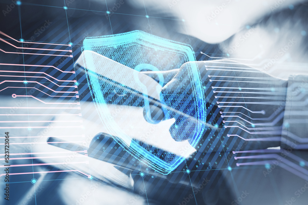 Aufkleber Close up of businessman hands using tablet and smartphone on desktop and creative glowing shield circuit security hologram on blurry background. Safety and web protection concept. Double exposure.