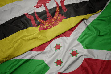 waving colorful flag of burundi and national flag of brunei.