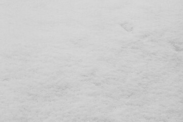 White background. The texture of the surface of the snow.