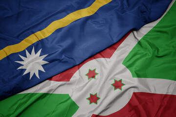 waving colorful flag of burundi and national flag of Nauru .