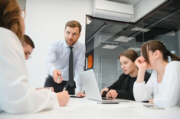 Group of young people in business meeting