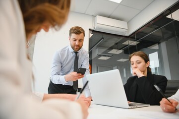 Group of young people in business meeting