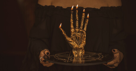 Candle burns on the altar, magic among candles, clean negative energy, wicca concept
