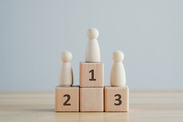 Wooden human standing on podium with ranking for winner business and sport competition concept. Human resource, Talent management, Recruitment employee, Successful business team leader concept.