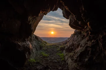 Zelfklevend Fotobehang Sunset on the last hiding place of king Caractacus, a cave on the hill fort of Caer Caradoc in Shropshire, England © jeremyabaxter