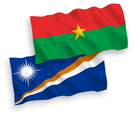 Flags of Republic of the Marshall Islands and Burkina Faso on a white background
