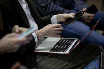 Press conference, man, businessman, typing on a laptop