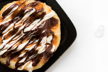  belgian waffles top chocolate  on white wooden background, top view.