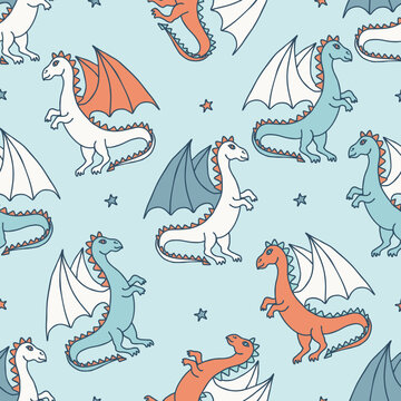 Seamless vector pattern of cute cartoon dragons and stars, texture for fabric print, souvenirs, baby's products design. Baby background. © Maria