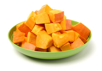Pumpkin cubes isolated on white background 