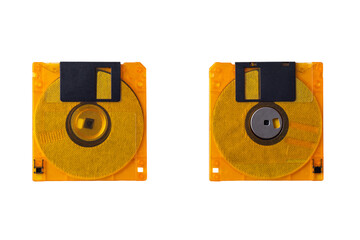 Plastic yellow floppy disk on both sides isolated on white.