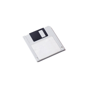 Plastic gray diskette isolated on white.