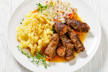 beef rouladen with potato mash and sauerkraut