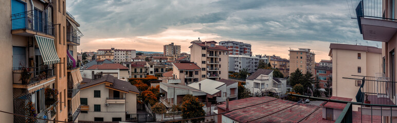 Fototapeta premium panoramica city skyline with clouds in bad weather of Aversa