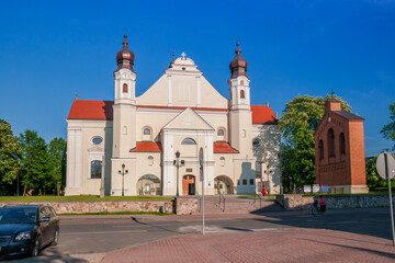 Collegiate Church of the Immaculate Conception of the Blessed Virgin Mary and St. Michael the Archangel. Lask, Lodzkie Voivodeship, Poland - obrazy, fototapety, plakaty