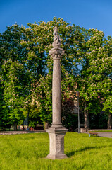 The column in front of the Collegiate Church. Lask, Lodzkie Voivodeship, Poland