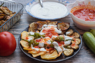 Traditional delicious Turkish food, fried mixed vegetables (potatoes, eggplant, zucchini, roasted peppers), Turkish name; mixed fried vegetables