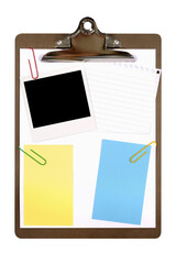 Clipboard with polaroid style photo print and notepaper isolated transparent background PNG file