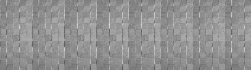 Gray grey stone concrete cement texture with square cubes mosaic background panorama banner long seamless pattern.