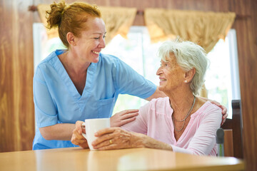 Woman from the nursing service takes care of the elderly