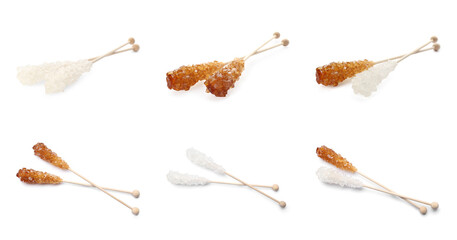 Set of wooden sticks with sugar crystals on white background. Tasty rock candies