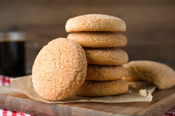 Delicious sugar cookies on wooden board, closeup