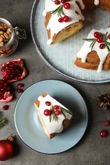 Flat lay composition with traditional homemade Christmas cake on grey table