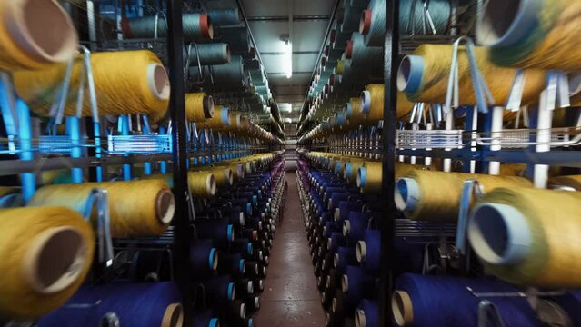 Carpet factory, carpet production, synthetic yarns for weaving loom.4k. 1