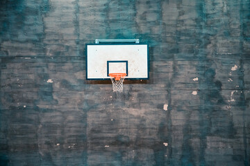 basketball hoop on a vintage concrete wall © Melinda Nagy